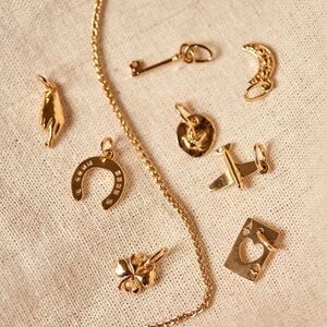 Sézane Irma gold pendant charms - clover, moon pair